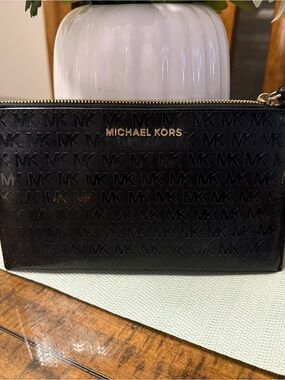 Michael Kors Black Embossed MK Zip Pouch with Gold Logo